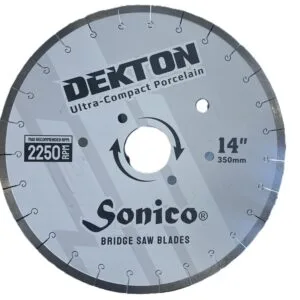 Dekton & Crystallized Glass Bridge Saw Blade | Sonico® Professional Quality, Sonico®Bridge Saw Diamond Blade for Dekton & Crystallized Glass.  Made with Highest Grade Diamonds for Fastest Cutting Action.  Achieve Cleanest & Most Precise Cutting Performance & Maximum Longevity. Utilize on Dekton, Lapitec, Neolith & Crystallized Nano-Glass Materials.  Made in South Korea. Size: 14" & 16" x 3.2mm Arbor: 60mm/50mm Diamond Height: 15mm Core: Silent Cutting Wet Cut Item#: 14/16 DEK